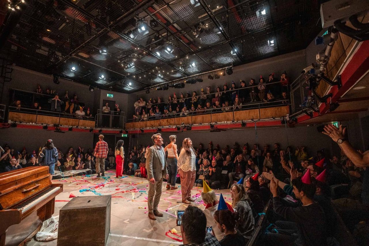 Park 200 Theatre Space with a full audience and a cast about to do their bows