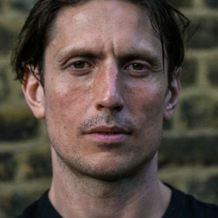 A headshot of Morgan from How to Fight Loneliness