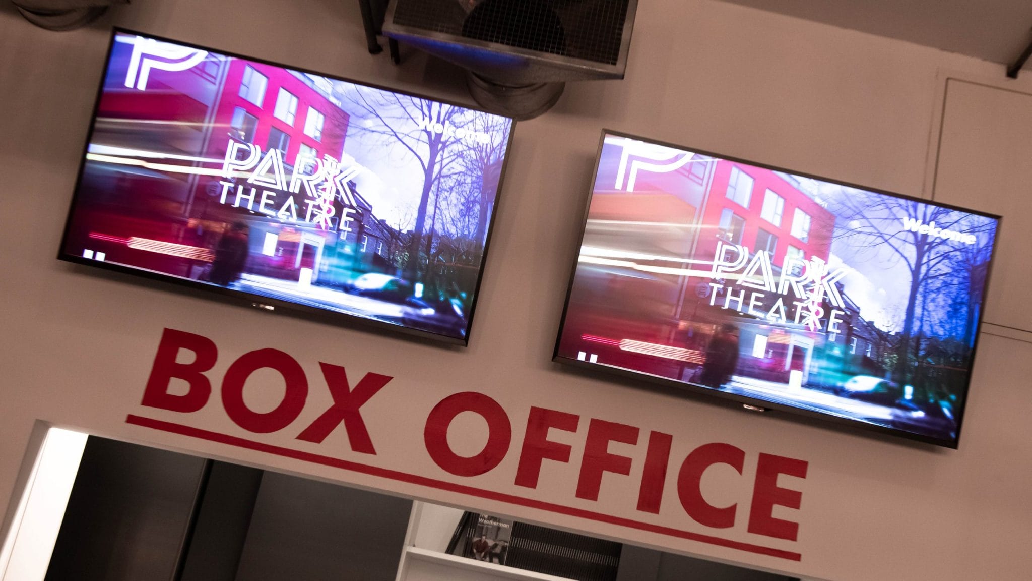 Inside the Park Theatre building, the TV's at the Box office show the Park Theatre Logo